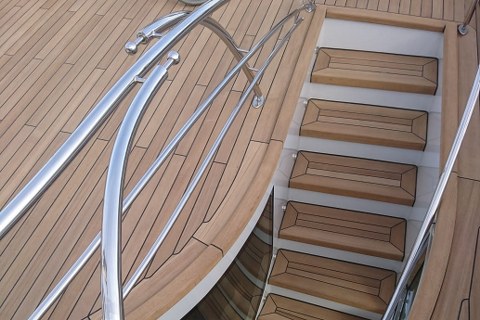 Teak deck and stairs on a mega yacht by Duca Solutions
