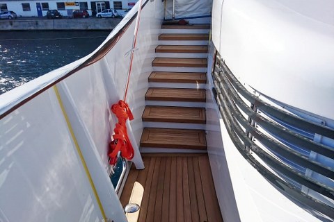 Teak deck covering on yacht by Duca Solutions