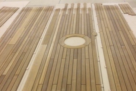 Prefabricated teak deck panels for yacht by Duca Solutions