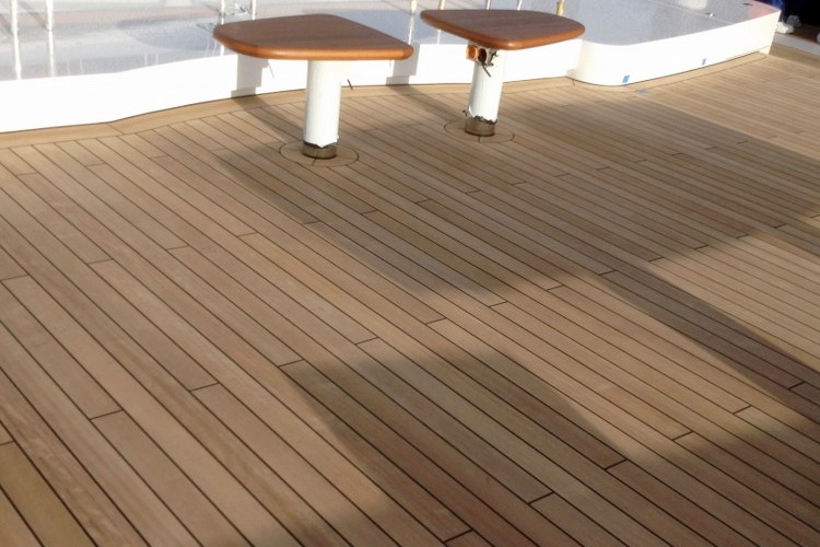 Teak decks on a mega yacht by Duca Solutions